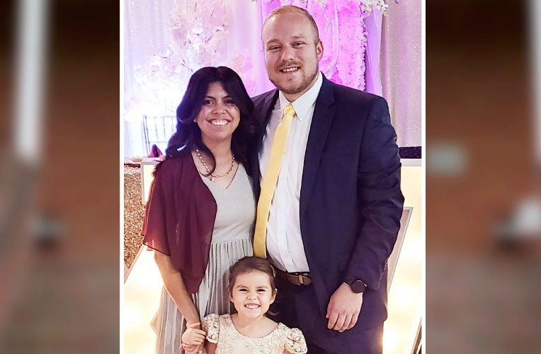 Hunter and Ragan Strength in front of the church